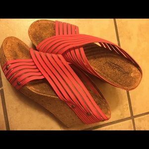 Nike athletic shoes and Salmon color sandles.